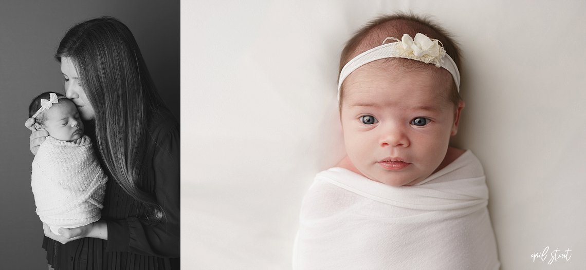 baby girl on simple white backdrop by april stout newborn photographer