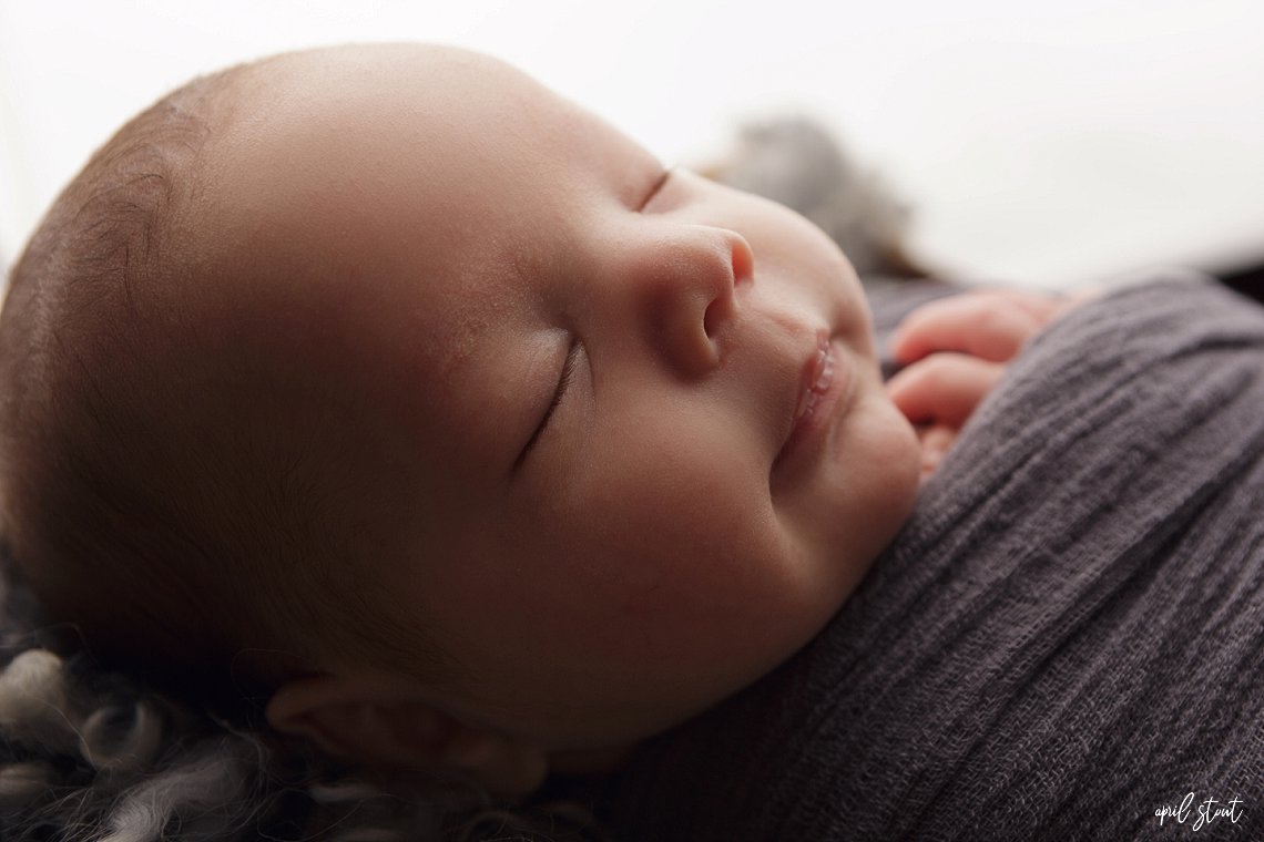 newborn baby boy photographed by april stout photography near Tulsa Oklahoma